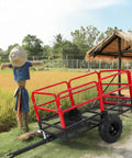 Beefy Heavy Duty Yard Trailer For ATV UTV Tow Dump Cart With 1600 Lbs Capacity, 22 Cu Ft, in a field with scarecrow