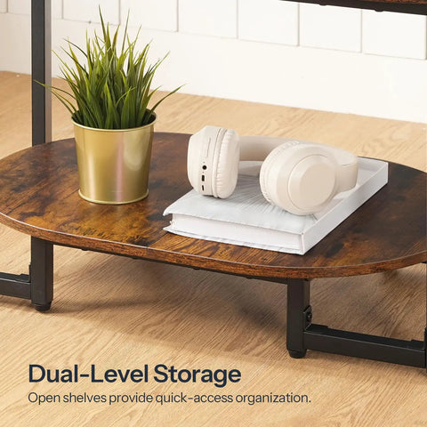 Oval Wood Coffee Table With Dual Open Storage Shelves Chill Farmhouse Vibe For Cozy Living Rooms And Home Offices Rustic Brown Finish showing dual-level storage with headphones and plant.