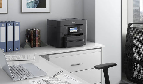 Wireless Color All In One Inkjet Printer With PrecisionCore Heat Free Tech And Instant Dry Pigment Ink on office desk.