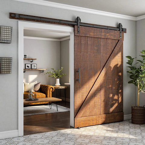 Built Like A Tank 7 Foot Sliding Barn Door Hardware Kit Featuring Heavy Duty Steel Tracks mounted on a rustic barn door.