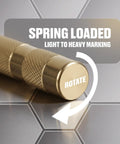 Automatic Center Punch For Metal And Wood Featuring Spring Loaded Kick And Adjustable Knob To Nail Every Drill Bit Start Instantly Without Hammering Or Walking For Dead On Precision Every Single Time showing adjustable strike knob with markings on metal surface.