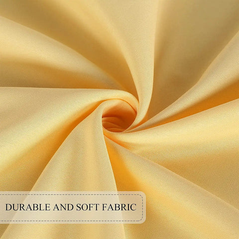 Close-up of the Yellow 60 Inch Round Outdoor And Indoor Tablecloth showing wrinkle-free, waterproof fabric texture.