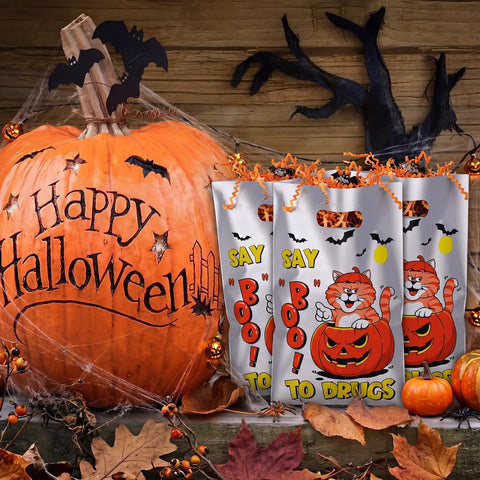 Say Boo To Drugs Halloween Reflective Gift Bags 150 Pack For Trick Or Treat Parties Party Favors Red Ribbon Week Candy Packaging And Anti Drug Decorations with Halloween pumpkin and bats design.