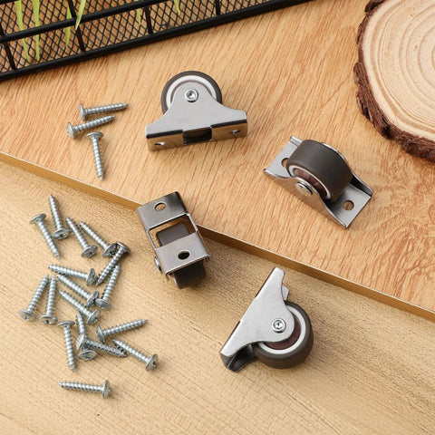 Heavy Duty Mini Caster Wheels 4 Pack For Cabinet Doors And Wardrobe Slide Rails Smoother Than Grease TPR Rollers displayed on wood.
