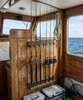 Wall Mounted Burnt Wood Fishing Rod Holder For Garage Adjustable Vertical Pole Rack That Holds Six Rods on boat cabin wall