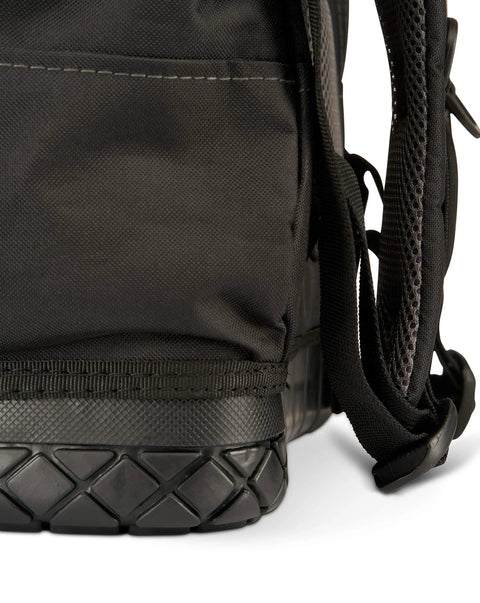 Close-up of waterproof base detail on heavy duty tool backpack in veil camo tac grey for tradesmen and DIYers.