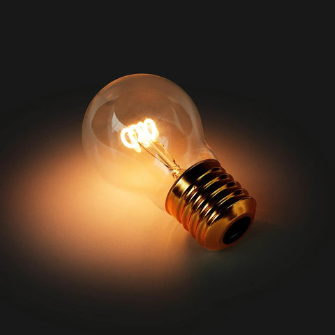 Cordless USB Rechargeable LED Light Bulb Lamp With Vintage Edison Glow Portable Bedside Night Light on dark background