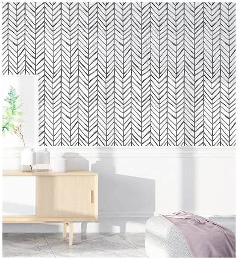 Room showcasing peel and stick black and white herringbone wallpaper with self adhesive vinyl decor easy install no mess durable and removable