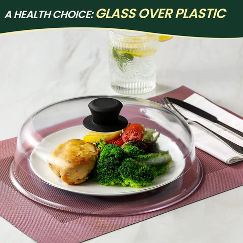 2 In 1 Glass Microwave Splatter Cover And Plate Mat Set with food under borosilicate glass, silicone handle knob visible