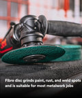Close-up of grinder with Ceramic Abrasive Fiber Disc 7 In X 7/8 In 60 Grit Resin Bond for metal grinding and welds on workbench.