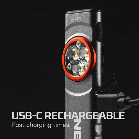 Close-up of Slim Mini Rechargeable Pocket Light for EDC and Emergencies showing USB-C port and charging cable attached.