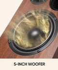 Close-up of the 5.2-inch woofer on Bluetooth Bookshelf Speakers For Turntable Setup Powered Studio Monitor With Five Point Two Inch Woofer Silk Dome Horn Tweeter Optical And RCA Inputs Subwoofer Line Out For Vinyl Playback.