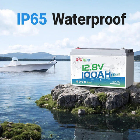 Bluetooth Enabled LiFePO4 Battery 12V 100Ah With Built In 100A BMS For Trolling Motor Marine Boats RVs And Solar Power Remote App Monitoring And Low Temperature Protection on rocky shore with boat in background