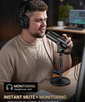 Male podcaster using Dual Interface USB XLR Podcast Microphone with Desktop Stand Built Mute Button and Volume Knob Studio Metal Build.
