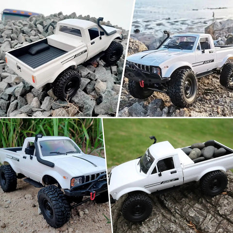 Rugged All Terrain 4x4 RC Crawler Truck 1 Sixteenth Scale Remote Control Pickup RTR Off Road Toy Car In White On Rocks