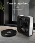 High Velocity Box Fan With Removable Grille, 5 Speed Settings shown in a room, with cord storage feature, ice white color
