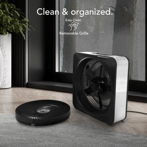 High Velocity Box Fan With Removable Grille, 5 Speed Settings shown in a room, with cord storage feature, ice white color