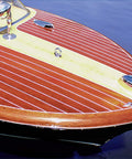 Pro Level Marine Spar Varnish Slaps On A Beefed Up Exterior Wood Shield on a glossy wooden boat deck with trim.