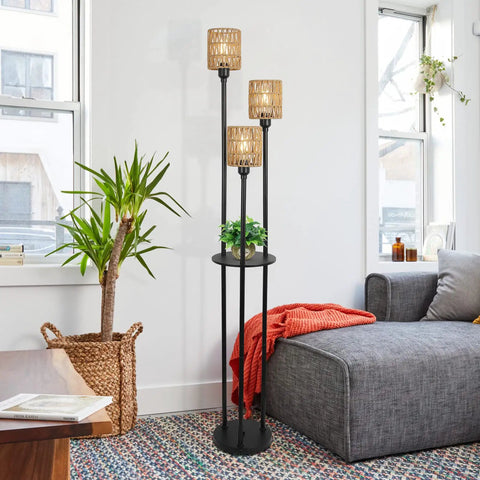 Boho Floor Lamp With Shelves And Three Lights in cozy living room, featuring rattan shades and acrylic shelf, next to gray sofa.