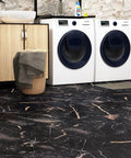 Laundry room with black marble peel and stick floor tiles, 12 by 12 inch, showcasing waterproof vinyl flooring