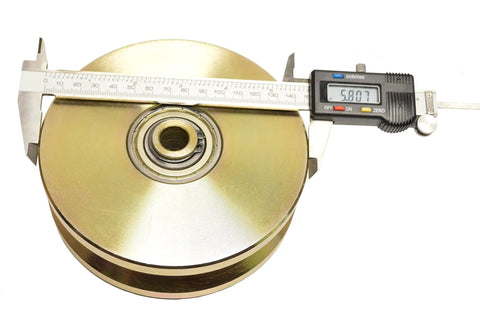 Heavy Duty Six Inch V Groove Gate Roller With Double Ball Bearings For Smooth Gliding Operation Built Tough As Nails Five Thousand Pound Load Capacity Corrosion Resistant Steel Hardware Set showing a close-up with measurement.