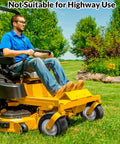 Man mowing lawn with zero-turn mower featuring Flat Free 11x6.00-5 Lawn Mower Tire And Wheel Set For Zero Turn Mowers Built Tough