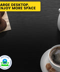 Large desktop showcasing a coffee cup with sugar, cookies on a napkin, and a teapot on a glossy black surface.