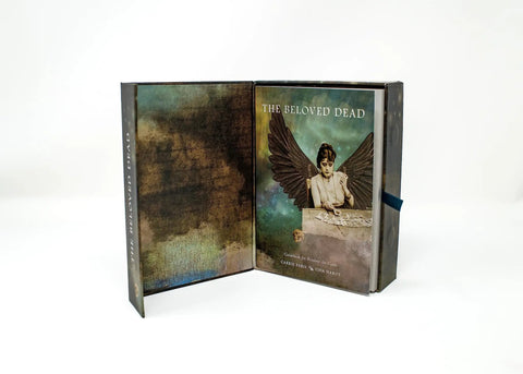 The Beloved Dead Oracle Deck & Guidebook For Divine Ancestral Wisdom, 82 Cards And 144 Page Full Color Manual displayed open.