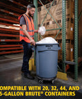 Worker using Dolly For Heavy Duty 20 To 55 Gallon Waste Cans With Easy Mobility And Secure Twist Lock Supports Up To 250 Pounds Ideal For Restaurants Back Of House Warehouses Offices Airports