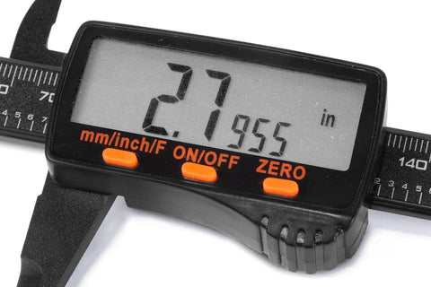 Close-up of 6.1 Inch Digital Caliper With LCD Readout For Inches, Millimeters And Fractional SAE Units displaying 2.7955 inches