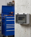 Rugged Push Button Protective Cover For Garage Door Control Panel, Impact Resistant Plastic Enclosure With Dust Shield on wall