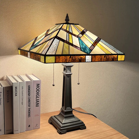 Two Light Tiffany Style Table Lamp With Antique Cream Amber Stained Glass, Handcrafted Shade, 16 Inch Wide, on wooden desk
