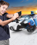 Child using controller with Switchback Assault RC Beast With Dual Ski System 2.4GHz RTR in snow, sunset backdrop