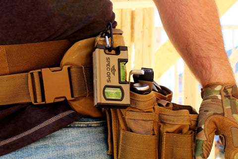 Pocket Sized Level For Framing And Layout Magnetic Four Inch Tool attached to tool belt for quick access