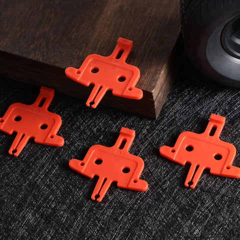 4 Pack Bicycle Disc Brake Spacers, Lightweight Plastic Disc Pad Spacers For Hydraulic Disc Brakes on black and brown background