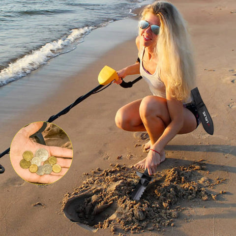 Heavy Duty Serrated Edge Metal Detecting Shovel With Belt Loop Sheath, Beast Digger used by woman on beach