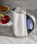 Stainless Steel Electric Kettle 1.7 Liter Cordless Design With 1500 Watt Power For Fast Boiling Tea Coffee And Hot Chocolate on marble countertop.