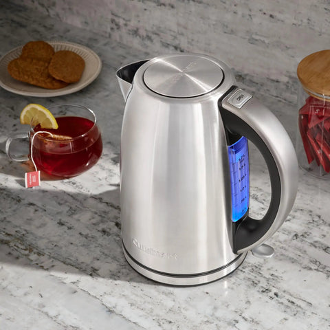 Stainless Steel Electric Kettle 1.7 Liter Cordless Design With 1500 Watt Power For Fast Boiling Tea Coffee And Hot Chocolate on marble countertop.