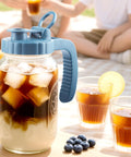 Two Pack 64 Oz Wide Mouth Pitchers With Stainless Steel Filters for cold brew coffee at picnic with fruits