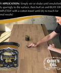 Woman applying Industrial Strength Butcher Block Oil For Cutting Boards And Countertops on wooden surface