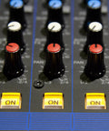 Close-up of control knobs on a 12 Channel Mixer With USB And SPX Digital Effects, Studio Grade D Pre Preamps Deliver Fat Bass and Smooth Highs