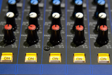Close-up of control knobs on a 12 Channel Mixer With USB And SPX Digital Effects, Studio Grade D Pre Preamps Deliver Fat Bass and Smooth Highs