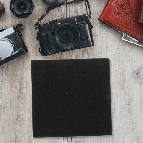 Black Foam Insert Packing Material With Extra Reinforcement For Fragile Gear Like Cameras Drones And Tools on table