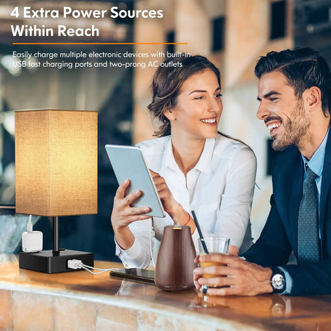 Couple beside 3 Way Dimmable Table Lamp With Touch Control and 2 USB Ports, grey shade, in living room bar setup