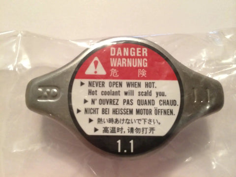 Front view of Honda Radiator Cap 19045-PAA-A01 Chrome Finish Replacement for Honda Engines, OEM-grade cap with warning label.