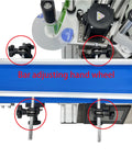 Slick Automatic Desktop Conveyor Round Bottle Labeler Featuring Precision Photoelectric Sensor And Quick Dial Adjustments with hand wheels.