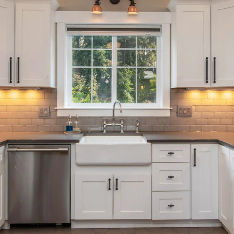 Modern kitchen with Oil Rubbed Bronze Cabinet Pulls 5 Inch 10 Pack, featuring white cabinets and stainless steel appliances.