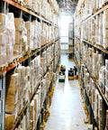 Two Pack Clear Stretch Film 12 X 1000 Feet 80 Gauge Heavy Duty Self Adhering Plastic Wrap With Handles used for palletized boxes in a warehouse.