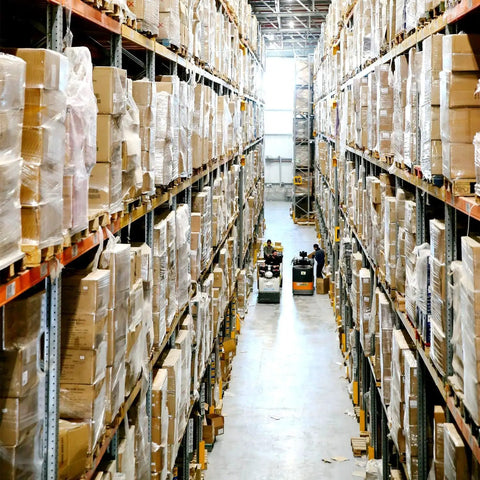 Two Pack Clear Stretch Film 12 X 1000 Feet 80 Gauge Heavy Duty Self Adhering Plastic Wrap With Handles used for palletized boxes in a warehouse.