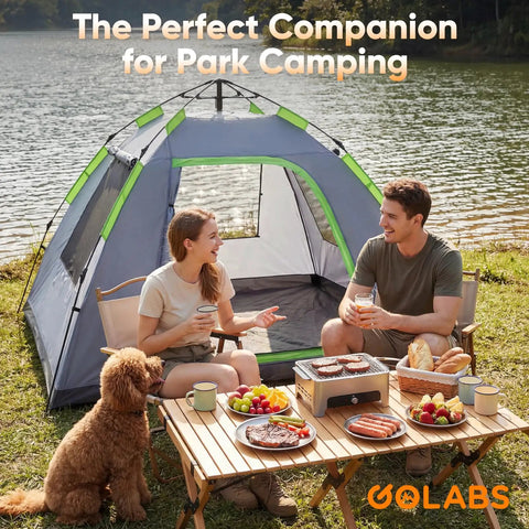 Two Person No Fuss Instant Camping Tent With 60 Second Setup And Pre Attached Pole by a lake with people and picnic setup